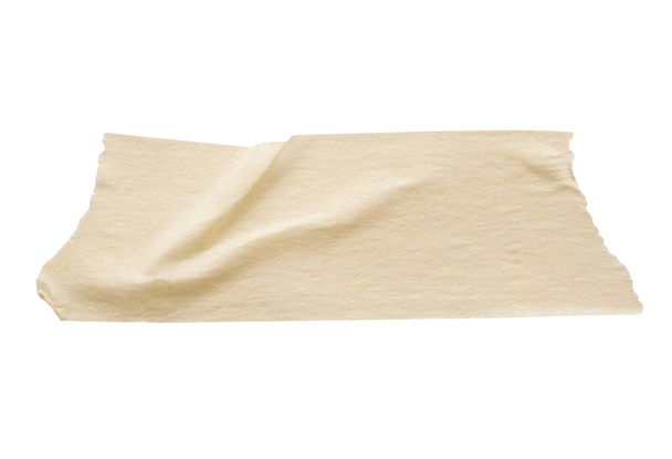 Sárga ragasztó papír szalag elszigetelt fehér alapon - Fotó, kép