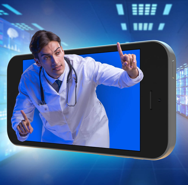 Concept de télémédecine avec médecin et smartphone - Photo, image