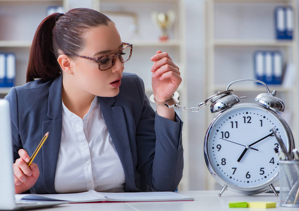 Businesswoman in time management concept - Photo, Image