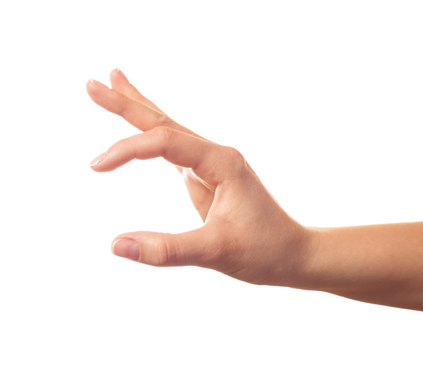 Human hand keeping something with two fingers - Φωτογραφία, εικόνα