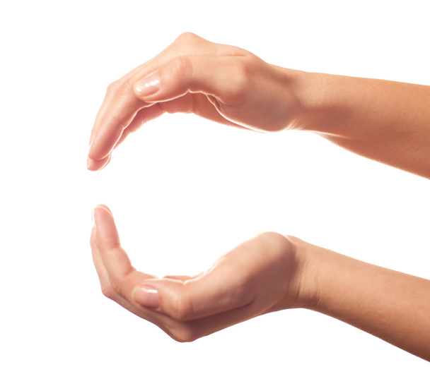 Two human hands showing sphere - Foto, imagen
