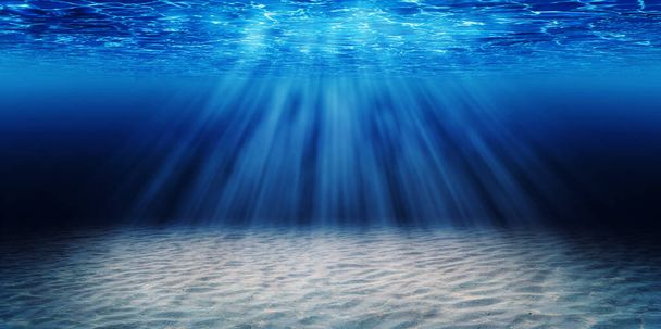 Αφηρημένη εικόνα της τροπικής άμμου παραλία στον πυθμένα του υποβρύχιου σκούρο μπλε βαθύ ωκεανό ευρύ φόντο της φύσης με ακτίνες του ήλιου. - Φωτογραφία, εικόνα