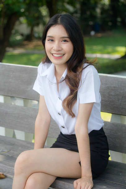 Portrait of thai adult student university uniform beautiful girl relax and smile - Foto, immagini