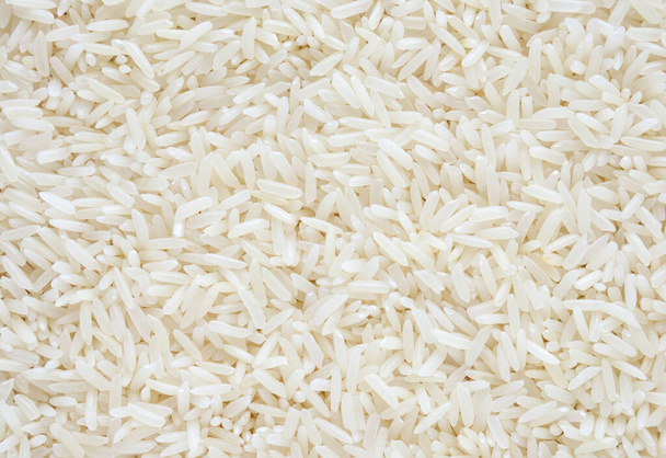 Thailand Jasmine rice grains texture background close up - Photo, Image