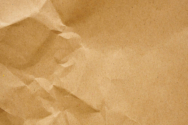 Papier pognieciony w kolorze brązowym, tło arkusza papieru z recyklingu - Zdjęcie, obraz