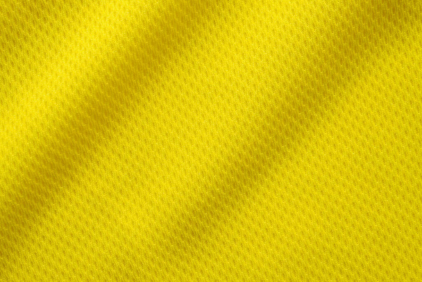 Žlutá barva fotbal dres oblečení textura sportovní oblečení pozadí, zblízka - Fotografie, Obrázek