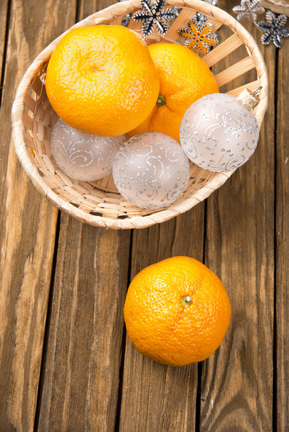 sweet fresh tangerine on the kitchen table - Фото, изображение