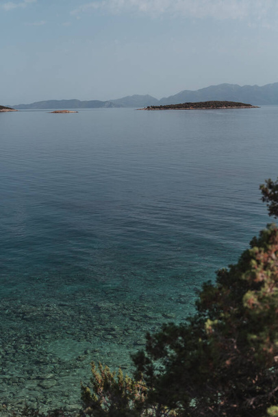 Beautiful Mediterranean landscape, beautiful clear water and pine trees on the shore. Travel to Turkey - Φωτογραφία, εικόνα