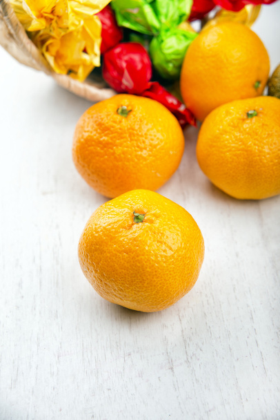 sweet fresh tangerine on the kitchen table - Fotó, kép
