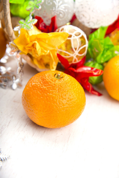 sweet fresh tangerine on the kitchen table - Zdjęcie, obraz