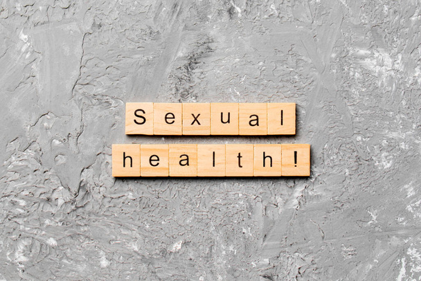 Sexual health word written on wood block. Sexual health text on table, concept. - Zdjęcie, obraz