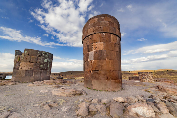 Burial Towers (Chullpas)  at the archaelogical Site of Sillustani on the shores of Lake Umayo near Puno, in Peru - Photo, Image