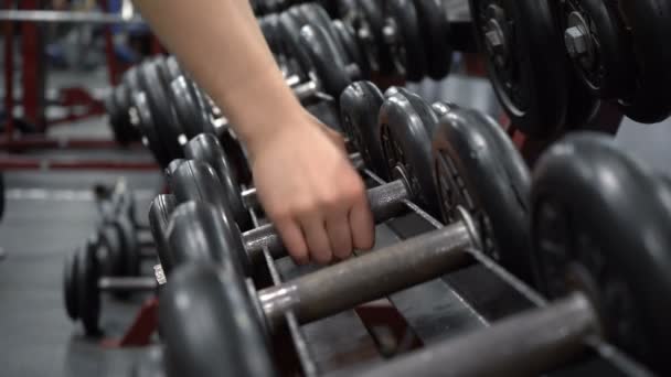 Video of dumbbells in fitness gym - Footage, Video