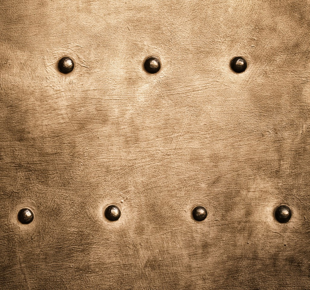 Grunge gold brown metal plate rivets screws background texture - Foto, immagini