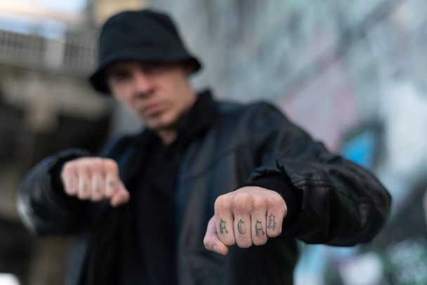 ACAB tattoo on the arm of a bully man - Foto, Bild