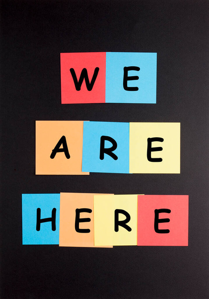 We Are Here text on colorful notes. - Photo, Image