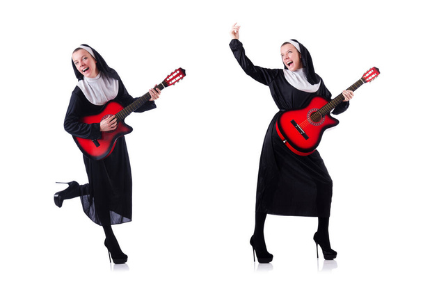 Nun playing guitar isolated on white - Fotografie, Obrázek