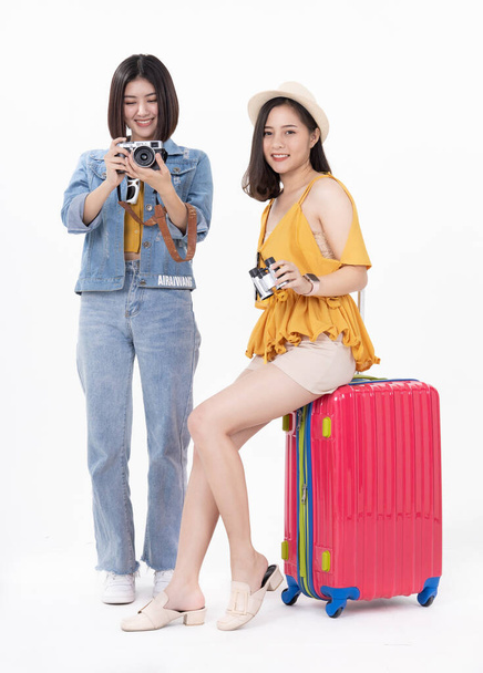 Beautiful young woman smiling  isolated on white background.Woman going to summer vacation.Travel trip funny.Two Friend  happy travel . - 写真・画像