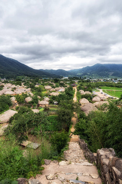 The view of Naganeupseong folk village in Suncheon, South Korea. Famous traditional Korean Joseon village taken during summer monsoon season - Photo, Image