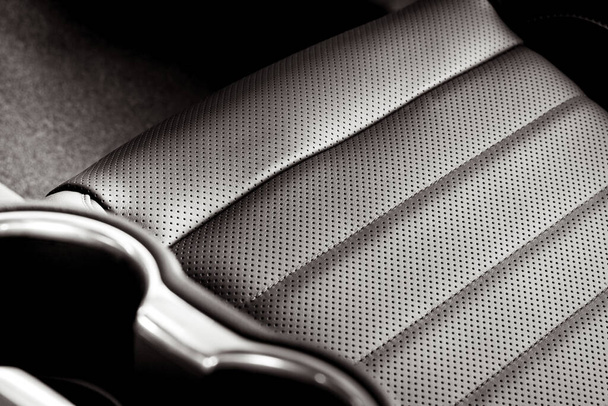 A closeup shot of a luxurious black interior of a modern car - Foto, afbeelding