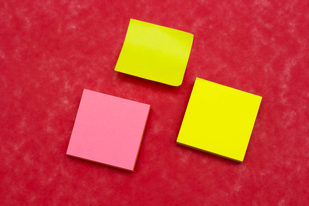 colorful sticky notes on  red background - Photo, Image