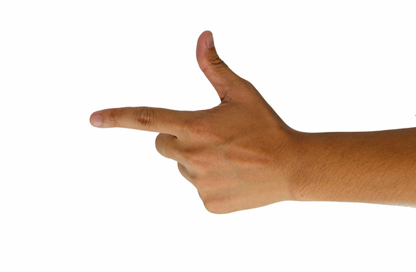 Pointing finger sign hand pistol gesture isolated over white bac - Photo, Image