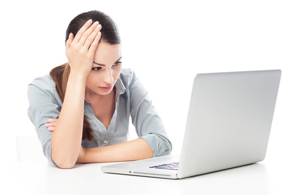 Worried woman using laptop - 写真・画像