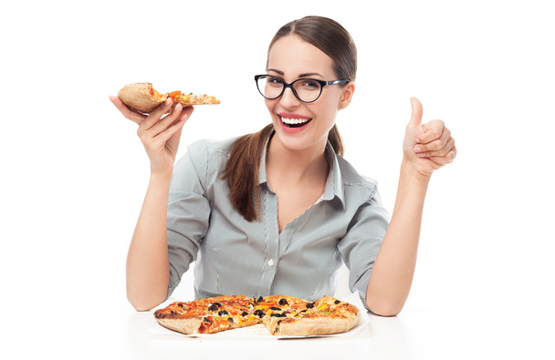 ピザを食べる女性 - 写真・画像