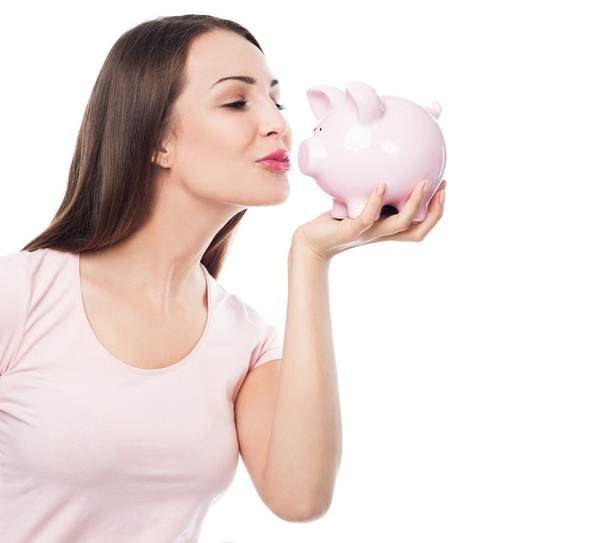 Woman with piggy bank - Foto, afbeelding
