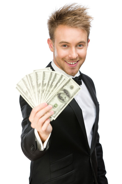 Businessman handing cash - Foto, afbeelding