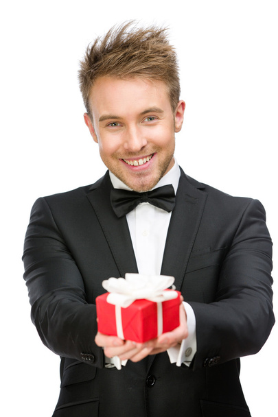 Businessman handing gift box - Foto, Imagen