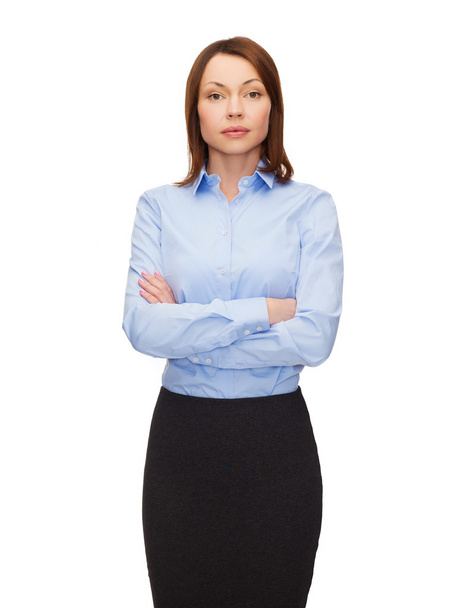 Smiling businesswoman with crossed arms - Photo, Image