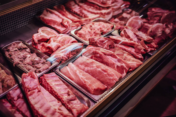 Sale of many types of cool meat in the store - Photo, image