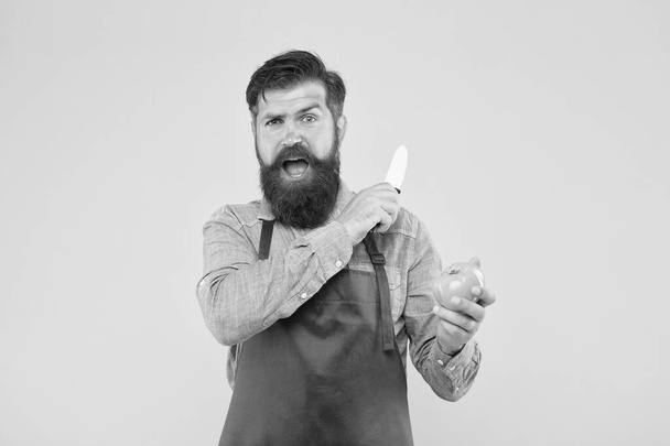 Mature man hold knife and vegetable. Chef prepares meal. Safe cutting. Cutting veggies. Ultimate list of cutting techniques every chef should know. Bearded man prepare tomato. Fresh salad recipe - Foto, immagini