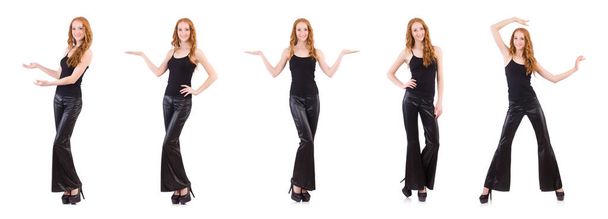Redhead woman in black bell bottom pants on white - Photo, Image