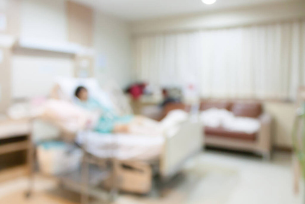 Αφηρημένη εσωτερικό δωμάτιο νοσοκομείου με κρεβάτι θολό φόντο - Φωτογραφία, εικόνα