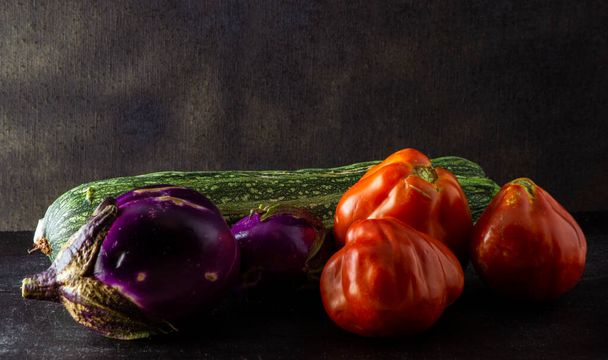 bio food vegetables on a black background. concept for natural lifestyle, healthy food, vegan philosophy, km0 food - Photo, Image