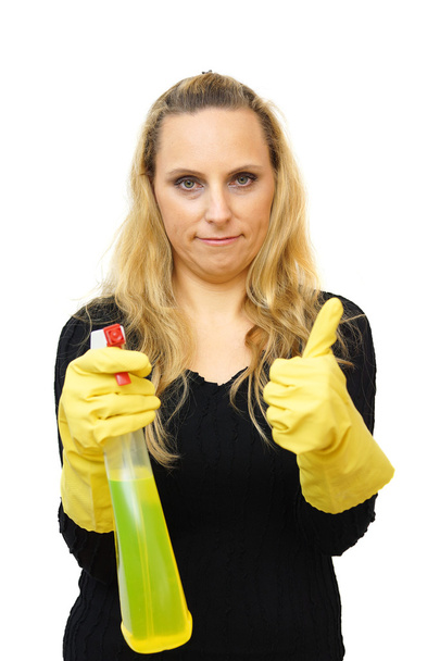 Mujer limpiadora sonriente con los pulgares hacia arriba gesto aislado sobre blanco
 - Foto, Imagen