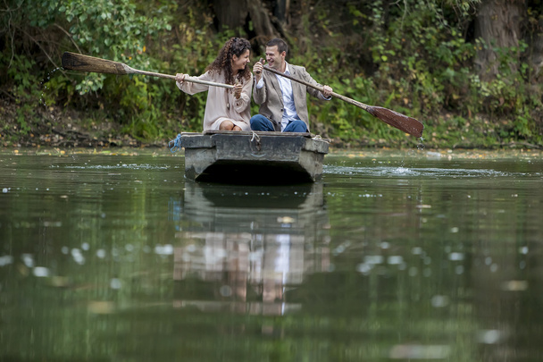 Loving couple in the boat - Foto, afbeelding