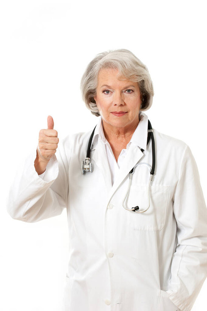 Senior female doctor with stethoscope - Φωτογραφία, εικόνα