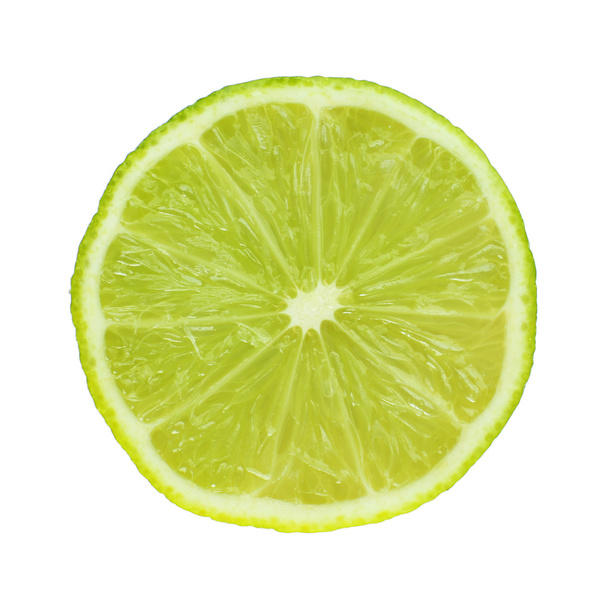 Slice of fresh lime, isolated on white - Photo, Image