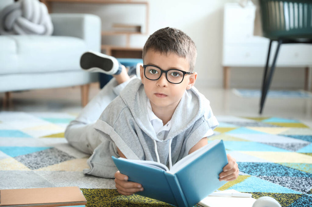 Cute little boy studying at home - Фото, зображення