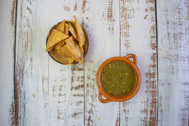 Top view Mexican Green Sauce with Tortilla Chips - Фото, зображення