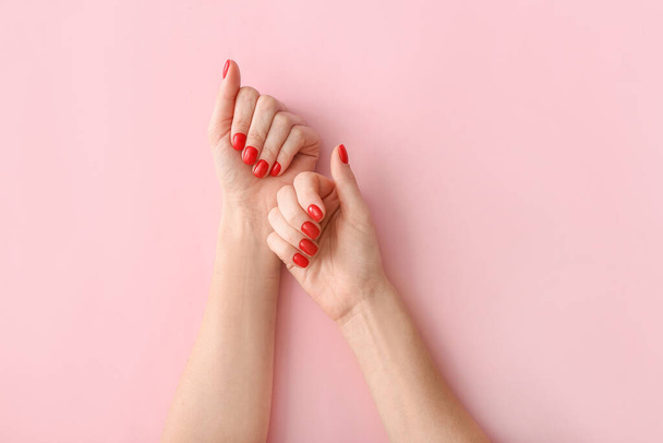 Hands with beautiful manicure on color background - Foto, immagini
