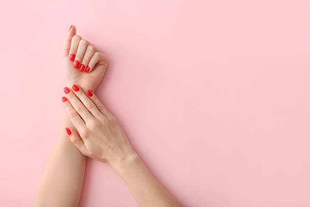 Hands with beautiful manicure on color background - Fotografie, Obrázek