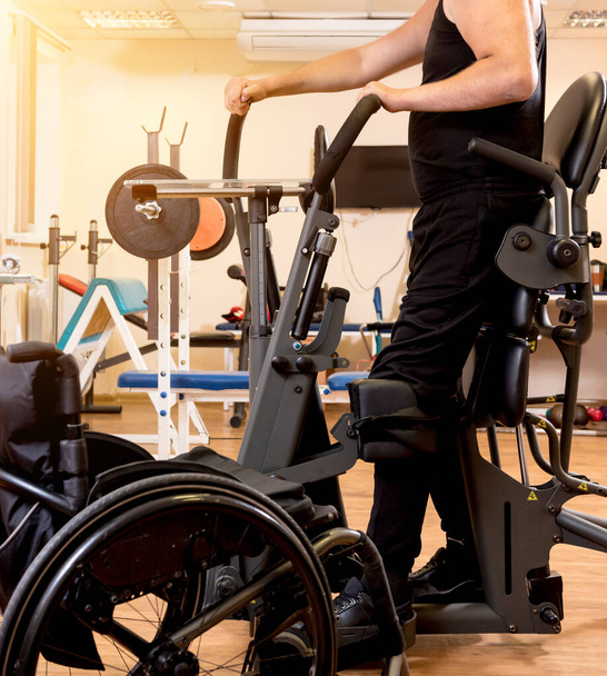 Disabled man training in the gym. Rehabilitation center - 写真・画像