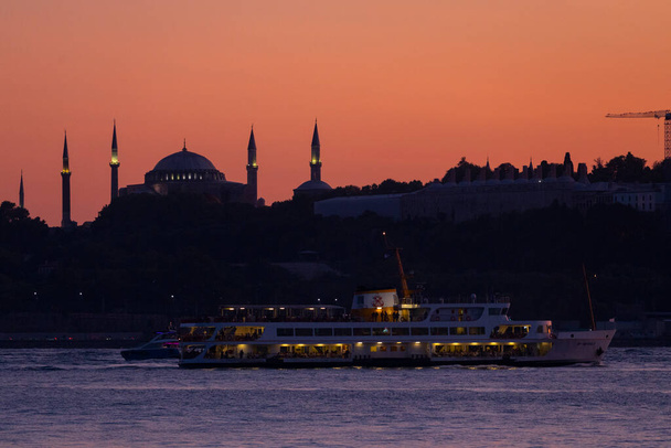 Istanbul city and sunset, the most beautiful viewsMaiden's Tower, New Mosque, Blue Mosque, Hagia Sophia, old clock, topkapi palace, the most beautiful views of Istanbul and sunset - Photo, Image