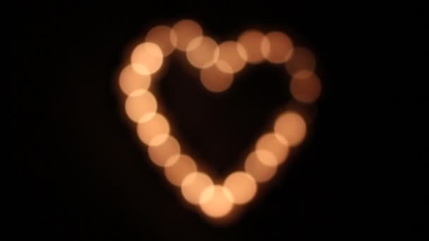 Forma de coração feito de velas
 - Filmagem, Vídeo