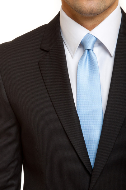 Traje gris con corbata azul
 - Foto, Imagen