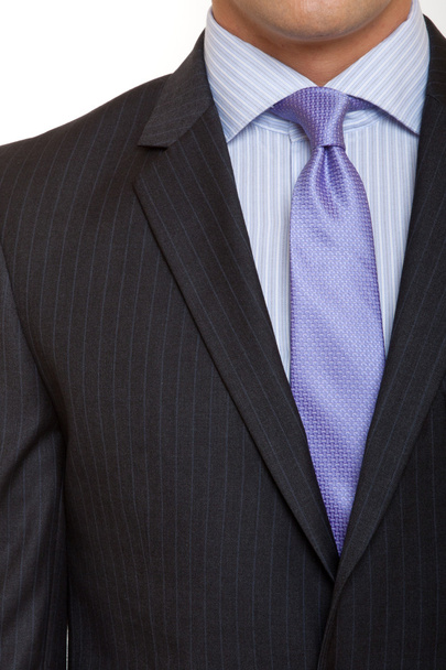Traje gris con corbata azul
 - Foto, Imagen